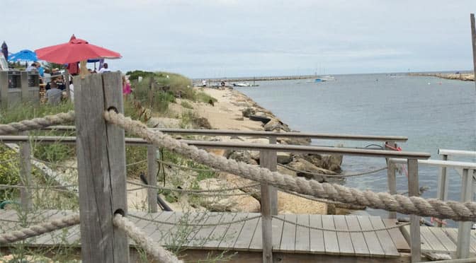 At low tide you can walk along the beach beyond the dog-friendly dining area at the Sesuit Harbor Cafe.