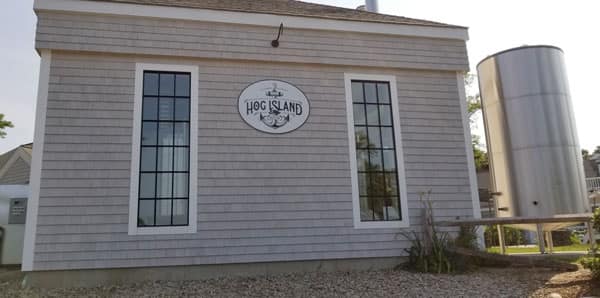 Hog Island Brewing Co. in Orleans on Cape Cod allows dogs on their outside seating area, but not inside. 