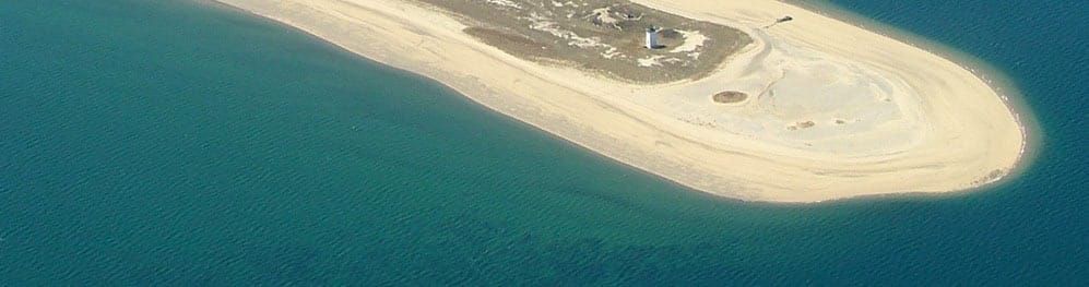 The aerial view of Woods End Lighthouse in Provincetown at the tip of Cape Cod  